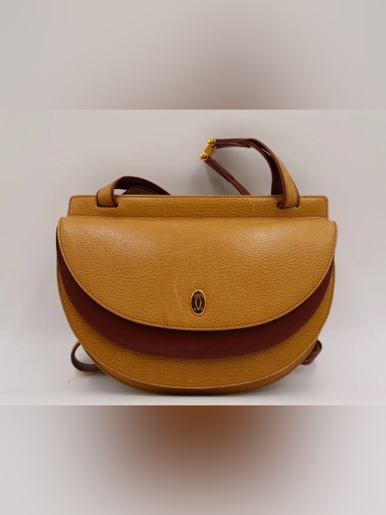Cartier Handbags - Cartier (Must de collection) Leather Crossbody Bag in Mustard and Brown